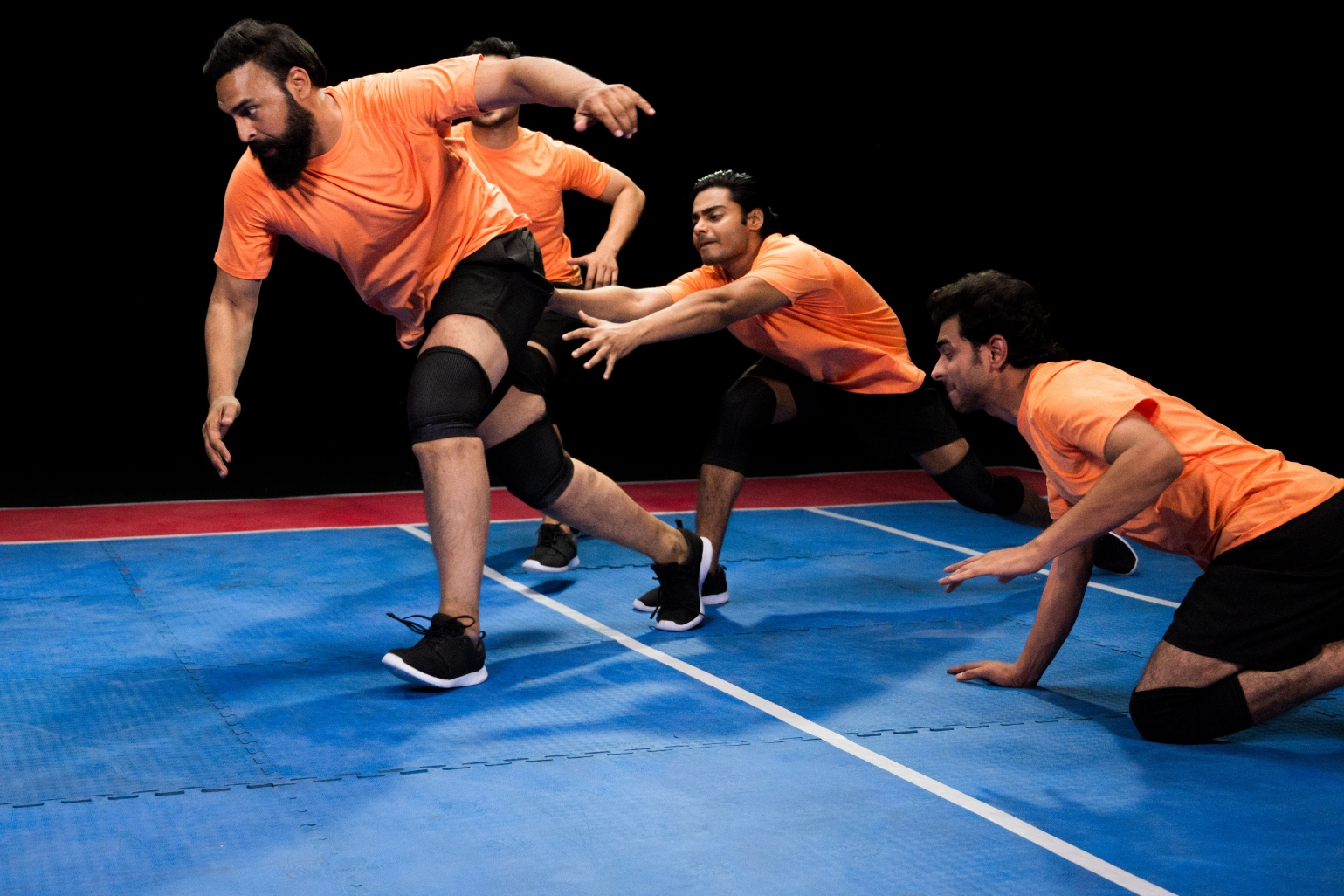 A group of men plays Kabaddi