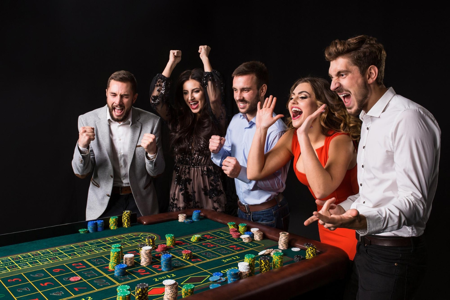 Bunch of people enjoying playing online casino game